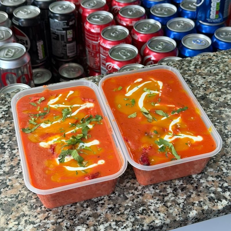 Freshly made tubs of the signature red sauce